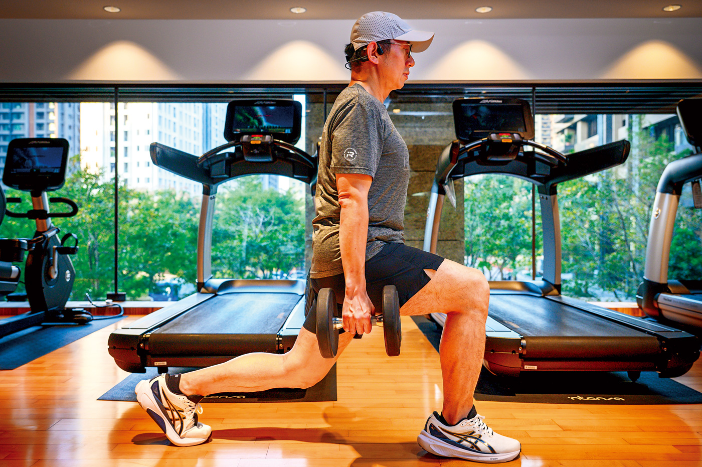 李明哲說自己做重訓多半是針對可以加強跑步效率的肌群。（攝影：李明宜）